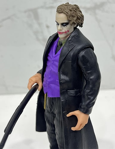 اکشن فیگور جوکر سیاه با جلیقه بنفش طرح McFarlane - Image 5